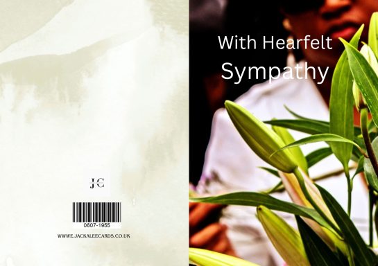 Cover of a sympathy card featuring lilies and a soft, muted background.