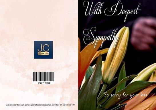 A bouquet of yellow lilies with a decorative card that reads "With Deepest Sympathy".
