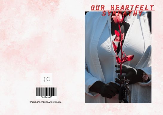 A white garment with a red ribbon detail on a pink background. Text overlay: "Our Heartfelt Symphony."