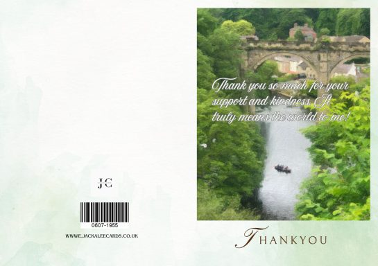 A serene view of a river with lush greenery and a stone bridge in the background.