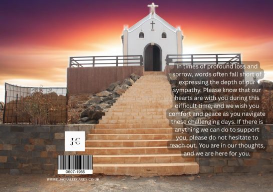 A small white chapel on a stone platform with steps, set against a vibrant sunset.